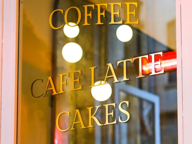 Gold letters on a glass door