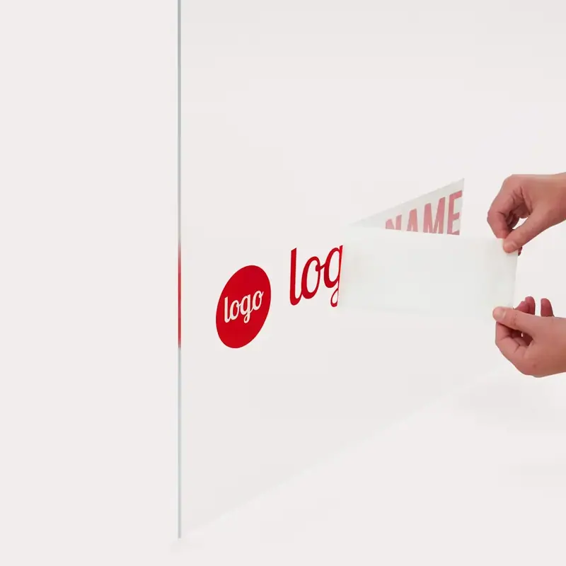 Letters on glass while the application tape is pulled off